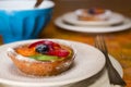 Closeup of a small fruit tart on a plate Royalty Free Stock Photo
