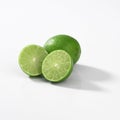 Closeup of small green key limes isolated on a white background Royalty Free Stock Photo