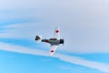 Closeup of a small private aircraft in flight over Houston Airshow in Texas