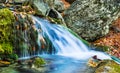 Closeup small waterfall in mountain canyon