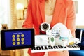 Closeup on smart home devices and tablet PC in hands of woman Royalty Free Stock Photo