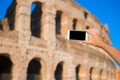 Closeup smart phone take the photo of Colosseum in Rome, Italy Royalty Free Stock Photo