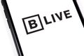 Closeup smartphone with BitTorrent LIVE logo