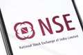 Closeup smartphone with NSE logo on the screen Royalty Free Stock Photo