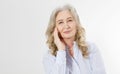 Closeup of smiling senior woman wrinkle face and gray hair. Old mature lady touching her wrinkled skin isolated on white Royalty Free Stock Photo