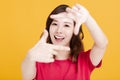 Closeup of Smiling Woman Making Frame Gesture Royalty Free Stock Photo