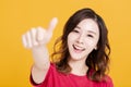 Closeup of Smiling Woman Making thumbs up  Gesture Royalty Free Stock Photo