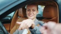 Closeup smiling woman sitting in new car. Happy woman getting keys from new car Royalty Free Stock Photo