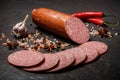 Closeup smoked cervelat pepperoni sausage with garlic and chili