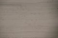 Closeup smooth cut limestone rock face wallpaper background