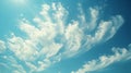 Closeup of the smooth individual strands of a feathery altostratus cloud blending into the sky