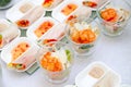 Closeup snacks at catering, banquet, buffet, finger food, shrimp, vegetable spring rolls in rice paper with peanut sauce in white Royalty Free Stock Photo