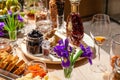 Closeup snacks, fresh and dried fruits, pieces parmesan cheese, honeycombs, dark chocolate, cinnamon sticks, nuts, biscotti. Royalty Free Stock Photo