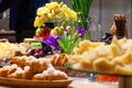 Closeup snacks, fresh and dried fruits, pieces parmesan cheese, honeycombs, dark chocolate, cinnamon sticks, nuts, biscotti. Royalty Free Stock Photo