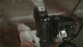 Closeup of snowblower and snow 4K UHD