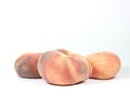 Closeup of snuffbox peaches against a white background Royalty Free Stock Photo