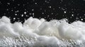 Closeup of soap bubbles resembling cumulus clouds on a black background Royalty Free Stock Photo