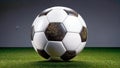 A closeup of soccer ball on a grass field with a dark background Royalty Free Stock Photo