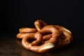 Closeup soft baked pretzels on old metal tray