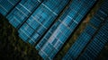 A closeup of the solar panels each piecemeal attached to a grid creating a beautiful pattern of blue and black Royalty Free Stock Photo