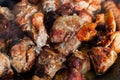 The closeup of some meat skewers being grilled in a barbecue. grilled meat skewers, barbecue Royalty Free Stock Photo