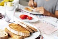 Young man preparing breakfast