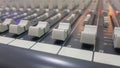 Closeup sound console volume mixer