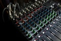 Closeup of the sound mixing console on stage. Royalty Free Stock Photo