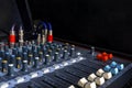 Closeup of the sound mixing console on stage. Royalty Free Stock Photo