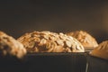 Closeup sourdough prune bread baking in oven