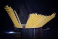 Spaghetti in pot with boiling water and steam. Royalty Free Stock Photo