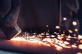 Closeup of Sparks that fly out when grinding metal details machine. Metallurgical Plant