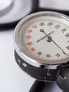 Closeup of a sphygmomanometer To measure blood pressure on white background Royalty Free Stock Photo