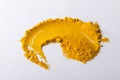 Closeup of spicy turmeric on the white background
