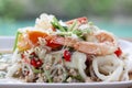 Closeup Spicy vermicelli salad in white plate.