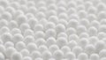 closeup spinning full-frame macro background of cotton earbud heads