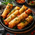 A closeup of spring rolls, a delicious finger food dish on a table Royalty Free Stock Photo
