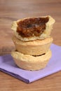 Closeup stack of butter tarts Royalty Free Stock Photo