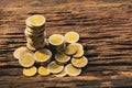 Closeup stack coin on wooden table. Financial and saving