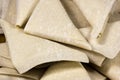 Closeup Stack of Freshly Folded Uncooked Samoosas