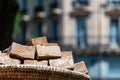 Closeup of a stack of sugarcane jaggery cubes in a basket Royalty Free Stock Photo