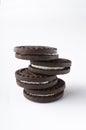 Closeup of stack of whole tasty sandwich cookies on the white background