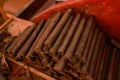 Closeup on stacked hand-rolled cigars Royalty Free Stock Photo
