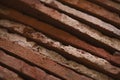 Closeup stacked old brick cut tiles