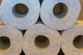 Closeup of a stacked pile of toilet paper, bathroom and household products, sanitary background