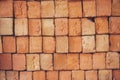 Closeup of stacked red clay handmade bricks Royalty Free Stock Photo