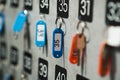Closeup stand of locker key at reception