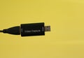 Closeup of a standard video capture card for gaming and streaming isolated on a yellow background Royalty Free Stock Photo