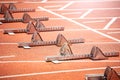 Closeup of start blocks for sprint running track Royalty Free Stock Photo