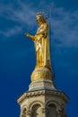 Gilded statue of Virgin Mary at Notre-Dame des Doms cathedral in Avignon, France Royalty Free Stock Photo